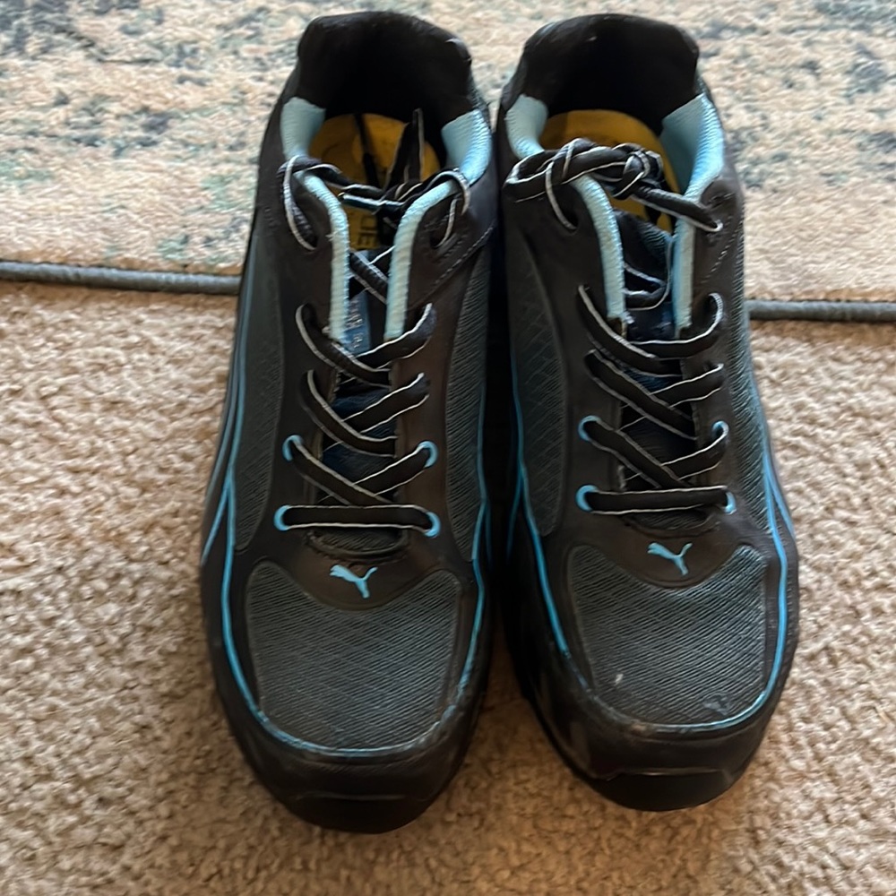 Women’s puma steel toe shoes.